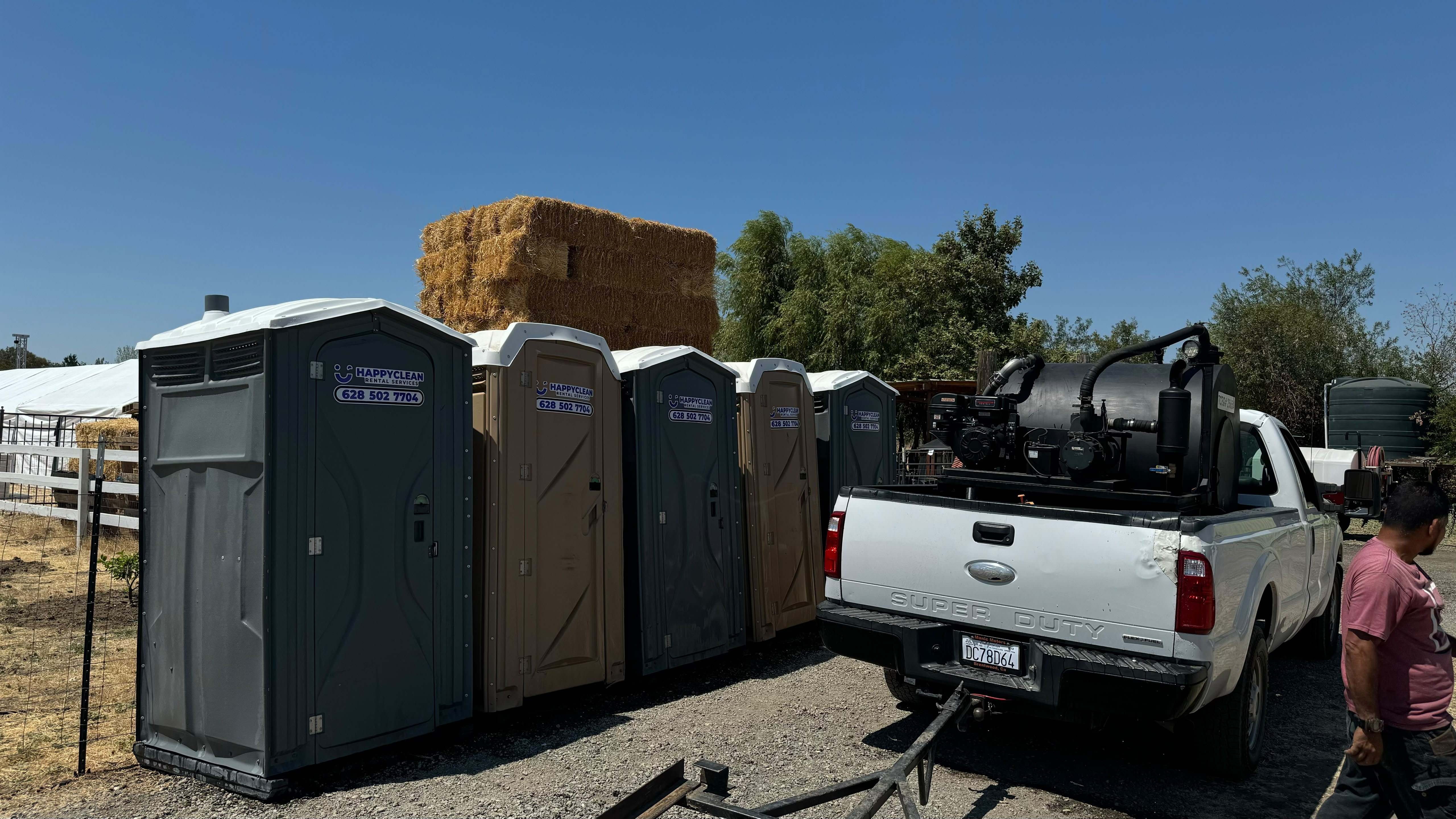 Portable restrooms set up for an outdoor event in the Bay Area